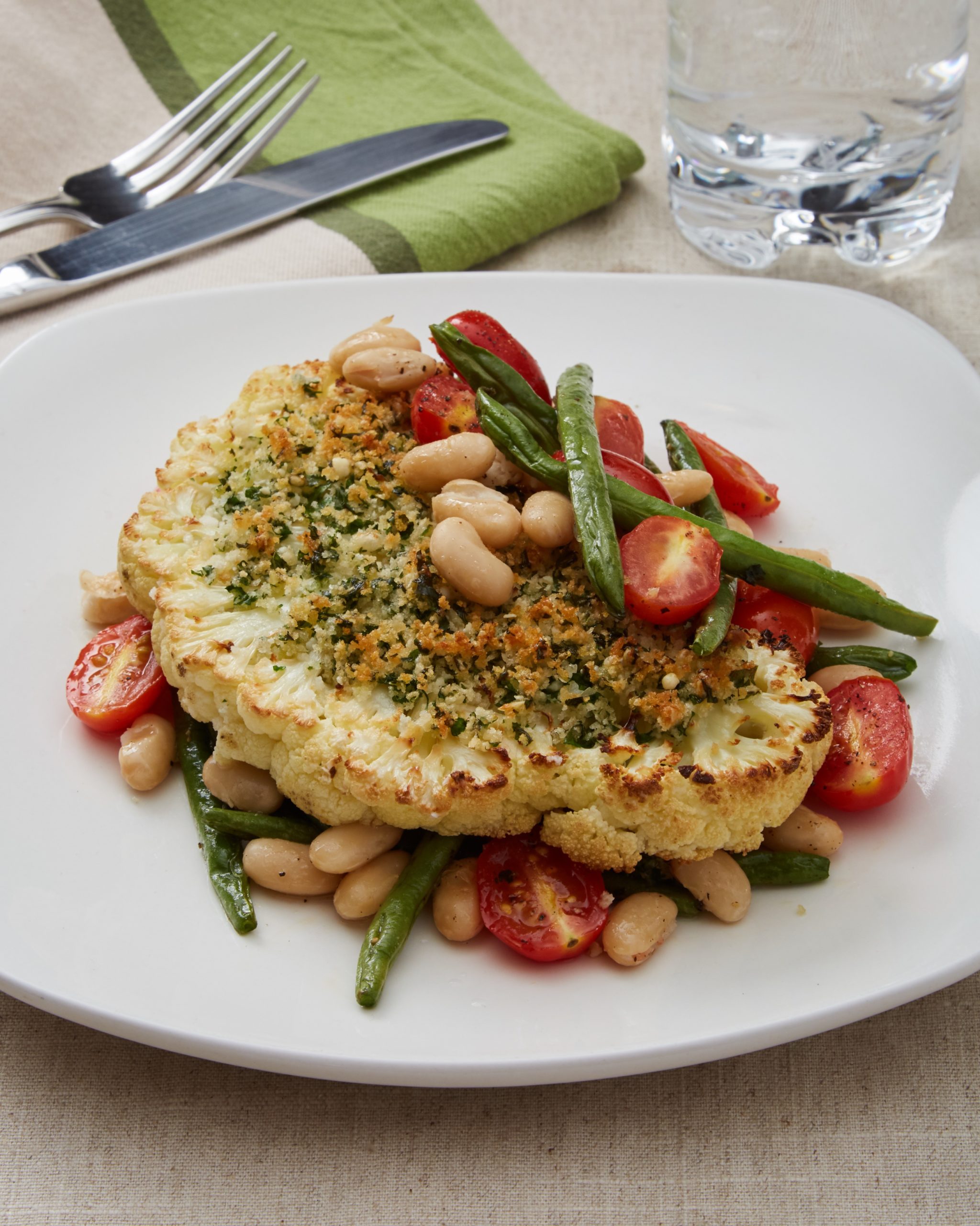 Cauliflower Steaks with Panko Crust, Tomatoes, Green Beans and White